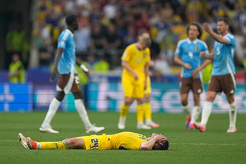 Oleksandr Tymchyk reacts after Ukraine and Belgium match